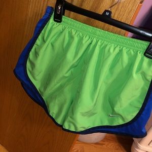 Green Nike running shorts